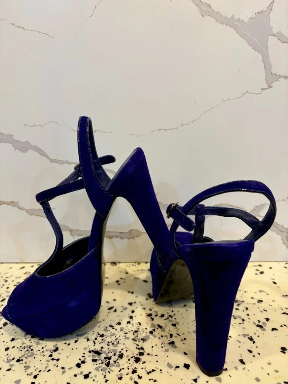 Suede Blue 7 1/2, excellent condition strap on shoe.